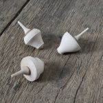 Small spinning top toy